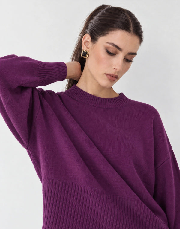 Knitted sweater with round neckline